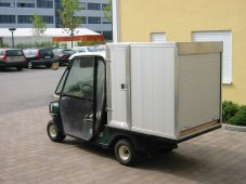 ezgo met cargo box en cabine